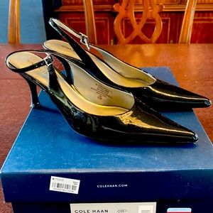 Nine West gently used sling back, patent, black heels.